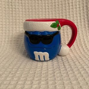 Galerie M&M Wearing Sunglasses & Santa Hat Mug